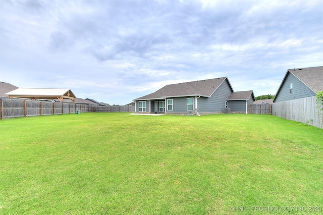 3604 E Quebec St, Broken Arrow, OK 74014 - rear view of house with a fenced backyard and a patio