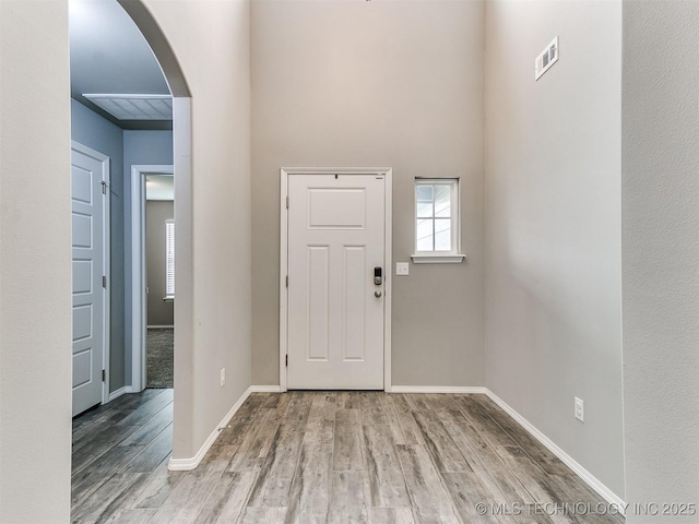 3604 E Quebec St, Broken Arrow, OK 74014 - entrance foyer with arched walkways and wood finished floors