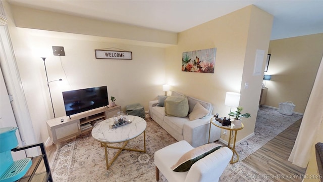 6663 S Victor Ave Unit Hj303, Tulsa, OK 74136 - living room featuring wood finished floors and baseboards