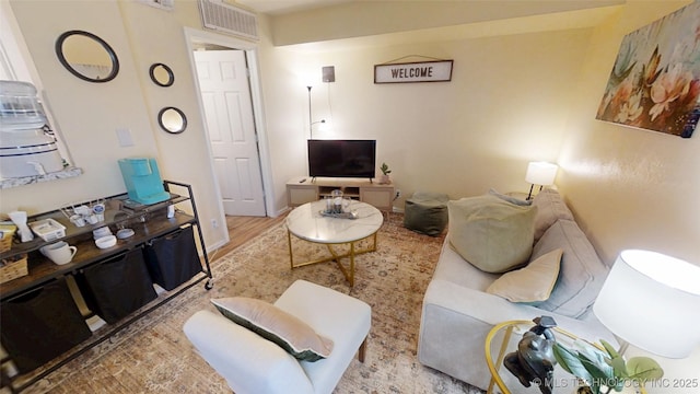 6663 S Victor Ave Unit Hj303, Tulsa, OK 74136 - living room with wood finished floors