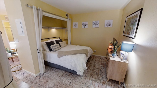 6663 S Victor Ave Unit Hj303, Tulsa, OK 74136 - bedroom featuring baseboards