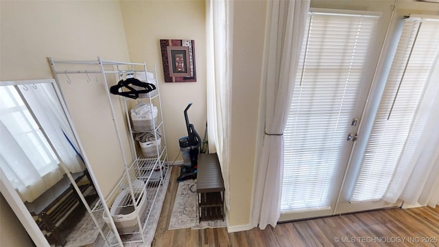 6663 S Victor Ave Unit Hj303, Tulsa, OK 74136 - corridor with wood finished floors