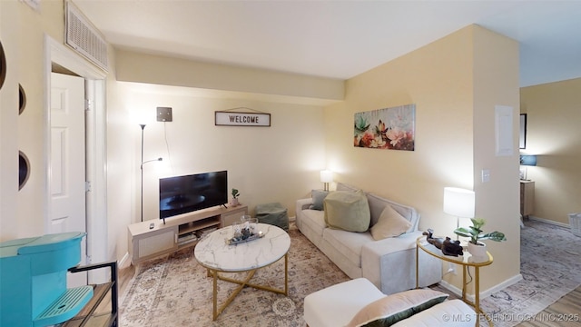 6663 S Victor Ave Unit Hj303, Tulsa, OK 74136 - living area featuring wood finished floors