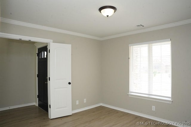 11906 S Nandina St, Jenks, OK 74037 - empty room featuring wood finished floors and crown molding