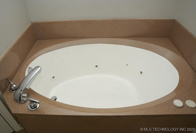 11906 S Nandina St, Jenks, OK 74037 - bathroom view of a tub with jets