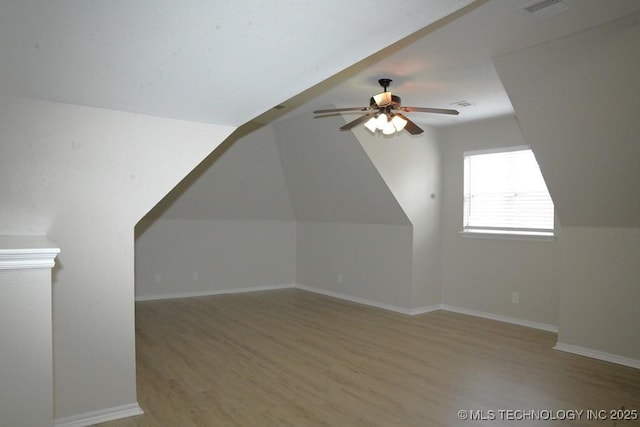 11906 S Nandina St, Jenks, OK 74037 - bonus room with wood finished floors, ceiling fan, and lofted ceiling