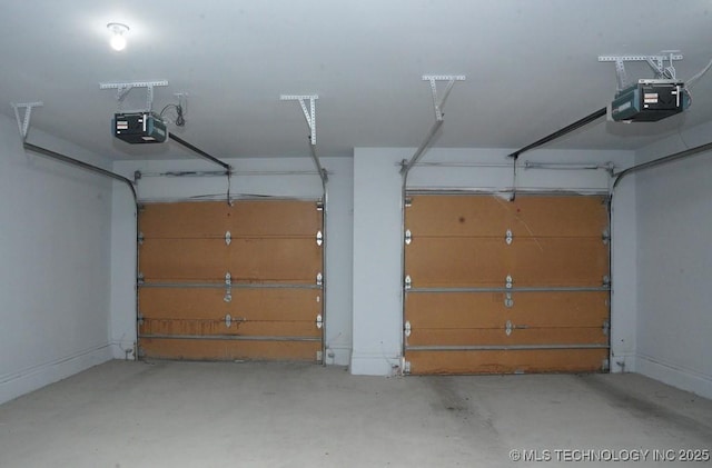 11906 S Nandina St, Jenks, OK 74037 - garage featuring a garage door opener