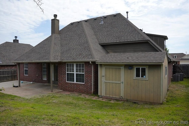 11906 S Nandina St, Jenks, OK 74037 - rear view of property featuring a patio area, brick siding, a shingled roof, and a chimney