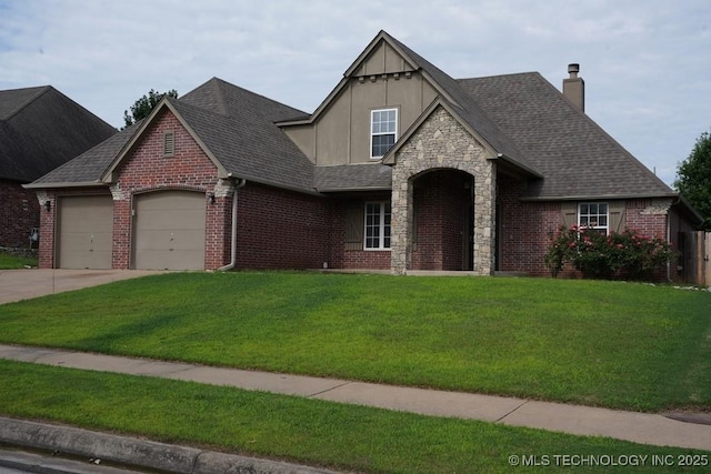 11906 S Nandina St, Jenks, OK 74037 - view of front of house featuring a chimney, an attached garage, a front lawn, and a shingled roof