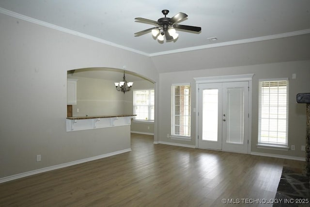 11906 S Nandina St, Jenks, OK 74037 - unfurnished living room with a chandelier, wood finished floors, a ceiling fan, ornamental molding, and arched walkways