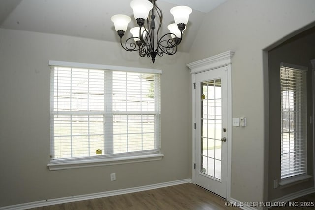 11906 S Nandina St, Jenks, OK 74037 - doorway with a chandelier, lofted ceiling, wood finished floors, and healthy amount of natural light