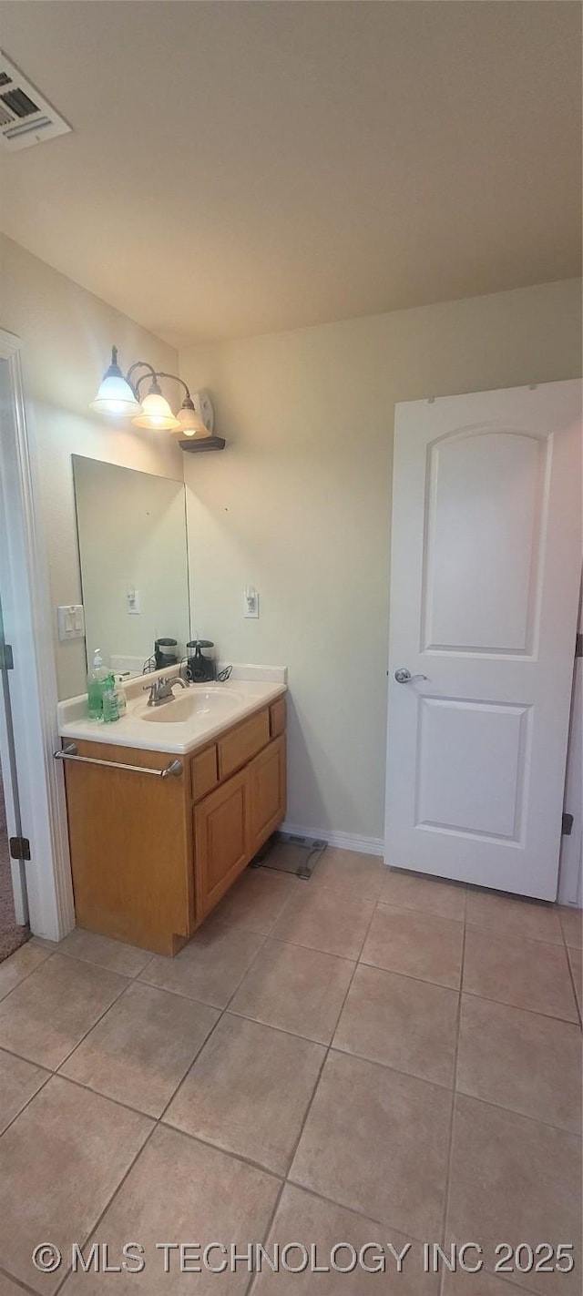 1704 Estates Dr, Grove, OK 74344 - bathroom featuring tile patterned flooring and vanity