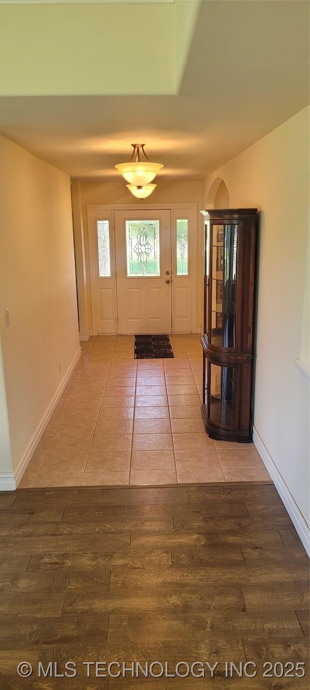 1704 Estates Dr, Grove, OK 74344 - foyer entrance featuring wood finished floors and baseboards