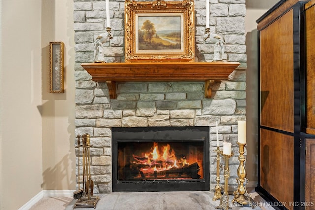 5070 Lake Breeze Rd, Grove, OK 74344 - detailed view of baseboards and a stone fireplace