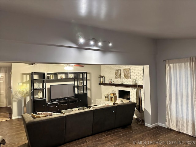 5908 S 68th E Ave, Tulsa, OK 74145 - living area featuring wood finished floors, ceiling fan, and a fireplace