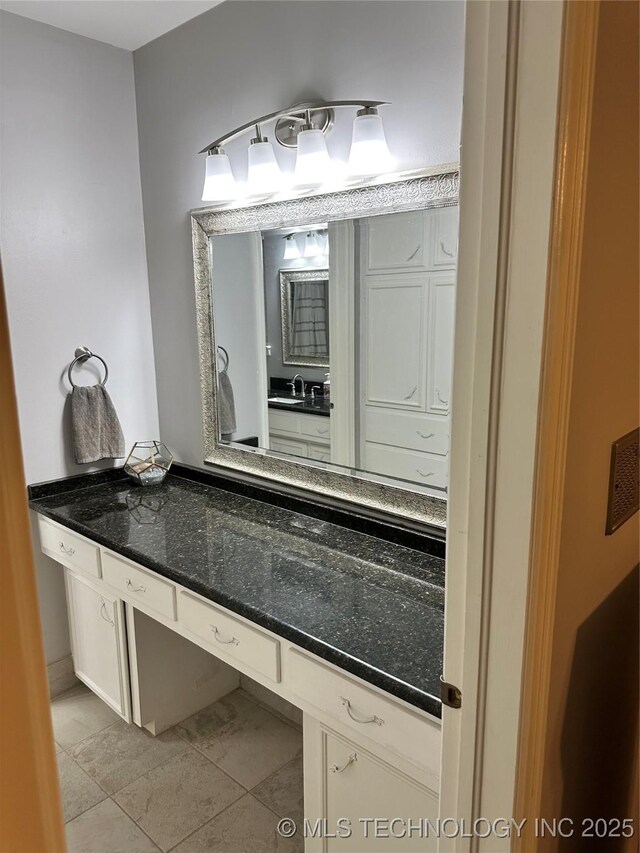 5908 S 68th E Ave, Tulsa, OK 74145 - bathroom with vanity and tile patterned flooring