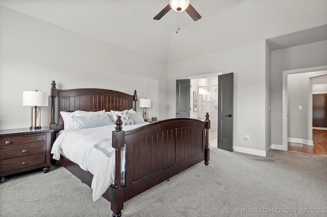 14305 S College Ave, Bixby, OK 74008 - bedroom with carpet, ceiling fan, connected bathroom, and high vaulted ceiling