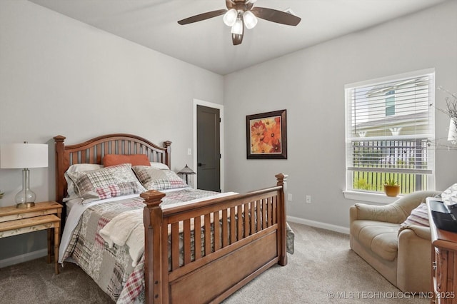 14305 S College Ave, Bixby, OK 74008 - carpeted bedroom featuring baseboards and a ceiling fan