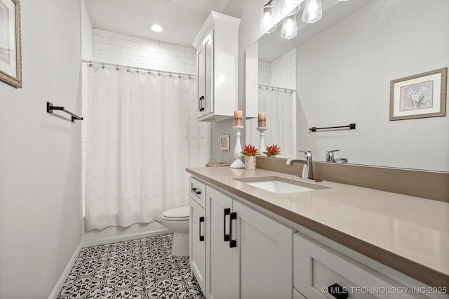 14305 S College Ave, Bixby, OK 74008 - full bathroom featuring vanity, recessed lighting, and shower / bath combo with shower curtain