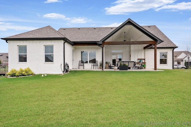14305 S College Ave, Bixby, OK 74008 - rear view of property with a shingled roof and a patio