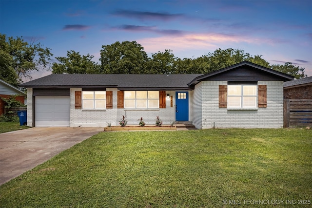 12317 E 18th St, Tulsa, OK 74128 - ranch-style home with brick siding, an attached garage, driveway, and entry steps