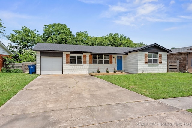 12317 E 18th St, Tulsa, OK 74128 - view of front of house with an attached garage, brick siding, and concrete driveway