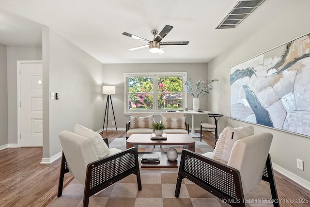 5861 S Hudson Pl, Tulsa, OK 74135 - living area with a ceiling fan and wood finished floors