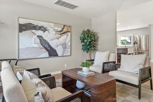 5861 S Hudson Pl, Tulsa, OK 74135 - living area featuring wood finished floors and recessed lighting