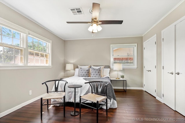 5861 S Hudson Pl, Tulsa, OK 74135 - bedroom with wood finished floors, ornamental molding, and ceiling fan