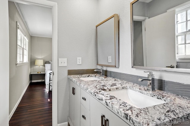 5861 S Hudson Pl, Tulsa, OK 74135 - bathroom with wood finished floors and double vanity