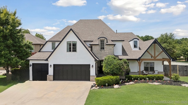 11802 S New Haven Ave, Tulsa, OK 74137 - view of front of property with stucco siding, a shingled roof, stone siding, concrete driveway, and an attached garage