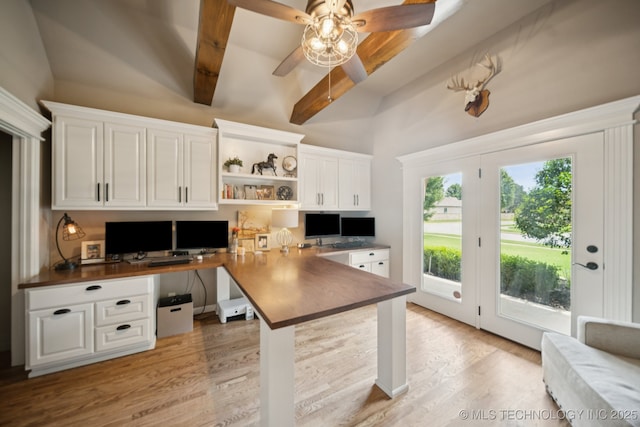 11802 S New Haven Ave, Tulsa, OK 74137 - kitchen with built in study area, white cabinets, open shelves, light wood-type flooring, and a peninsula
