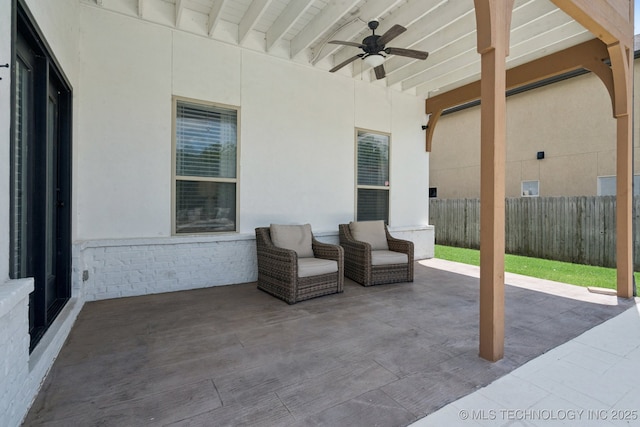 11802 S New Haven Ave, Tulsa, OK 74137 - fenced backyard with a ceiling fan and a patio area