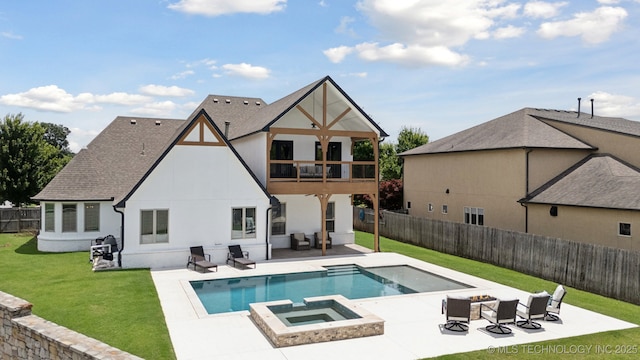 11802 S New Haven Ave, Tulsa, OK 74137 - back of house featuring a balcony, a patio area, an outdoor living space with a fire pit, a fenced backyard, and stucco siding
