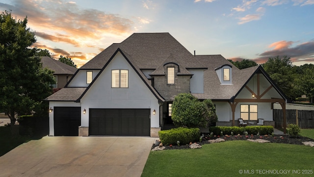 11802 S New Haven Ave, Tulsa, OK 74137 - view of front of home featuring a shingled roof, stucco siding, and concrete driveway