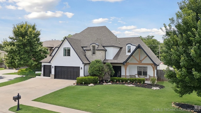 11802 S New Haven Ave, Tulsa, OK 74137 - view of front facade featuring driveway, stucco siding, a shingled roof, and a garage