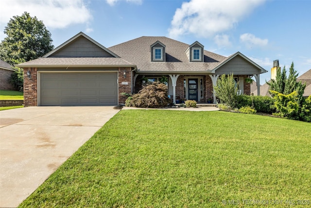 3331 Bunker St, Claremore, OK 74019 - view of front of property with brick siding, a front yard, concrete driveway, an attached garage, and a shingled roof