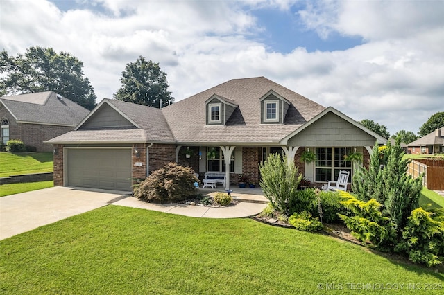 3331 Bunker St, Claremore, OK 74019 - cape cod house featuring brick siding, a garage, driveway, and a porch
