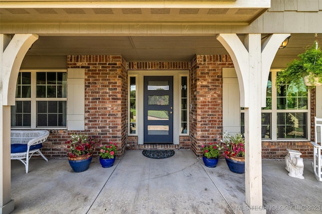 3331 Bunker St, Claremore, OK 74019 - property entrance with brick siding and a porch