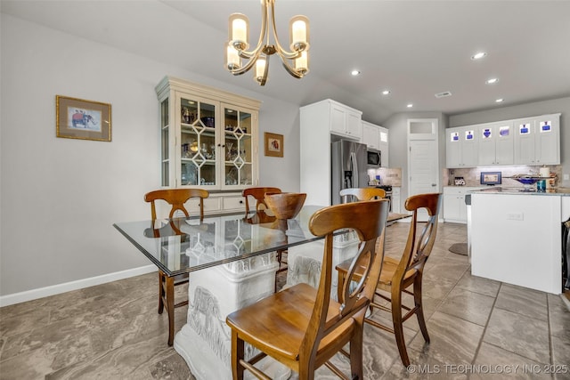 3331 Bunker St, Claremore, OK 74019 - dining space featuring a chandelier and recessed lighting