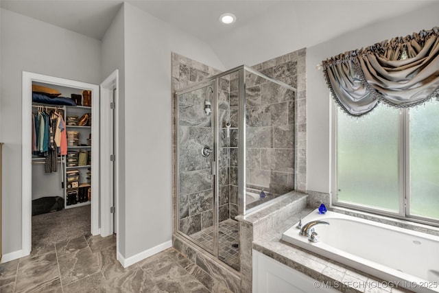 3331 Bunker St, Claremore, OK 74019 - full bathroom with a bath, a stall shower, and a walk in closet