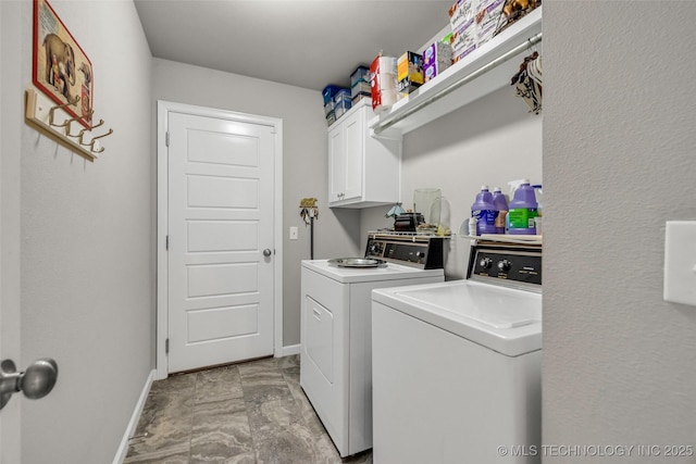 3331 Bunker St, Claremore, OK 74019 - laundry area with washing machine and dryer, cabinet space, and light marble finish floors