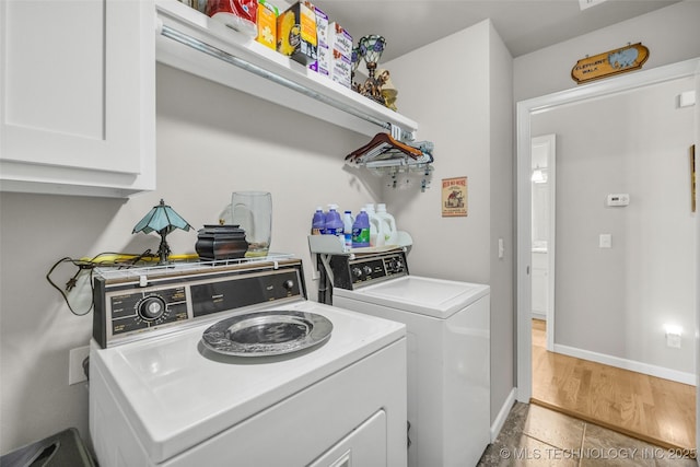 3331 Bunker St, Claremore, OK 74019 - washroom featuring washer and clothes dryer and cabinet space