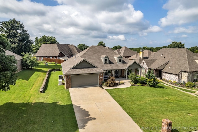 3331 Bunker St, Claremore, OK 74019 - view of front of home with brick siding, a garage, concrete driveway, and a front lawn