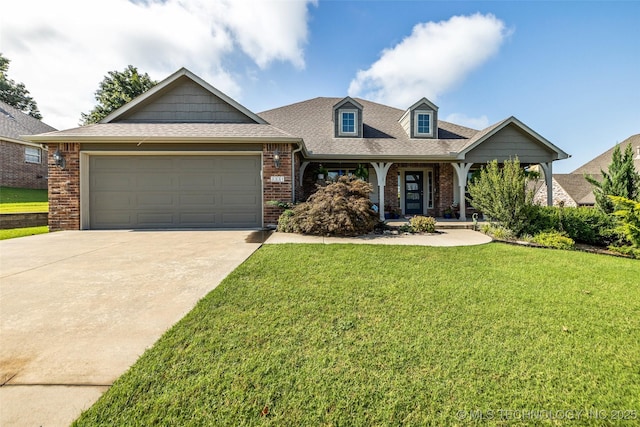 3331 Bunker St, Claremore, OK 74019 - view of front of house with concrete driveway, an attached garage, brick siding, a front yard, and a shingled roof