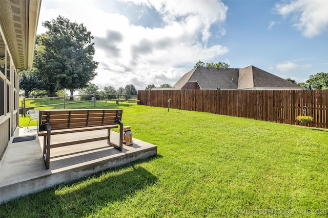 3331 Bunker St, Claremore, OK 74019 - fenced backyard with an outdoor living space