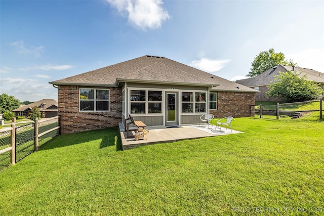 3331 Bunker St, Claremore, OK 74019 - back of house with a fenced backyard, brick siding, and a shingled roof