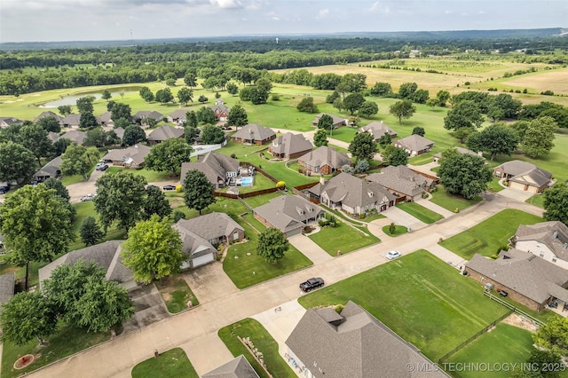 3331 Bunker St, Claremore, OK 74019 - aerial view of residential area with a large body of water and a golf course
