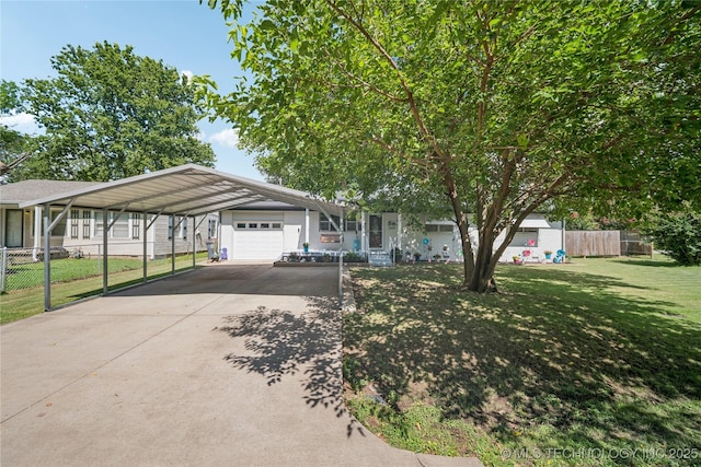 4647 S 30th W Ave, Tulsa, OK 74107 - view of front of property featuring a garage, concrete driveway, and a carport