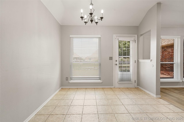 9005 N 154th E Ct, Owasso, OK 74055 - doorway with a chandelier and light tile patterned floors